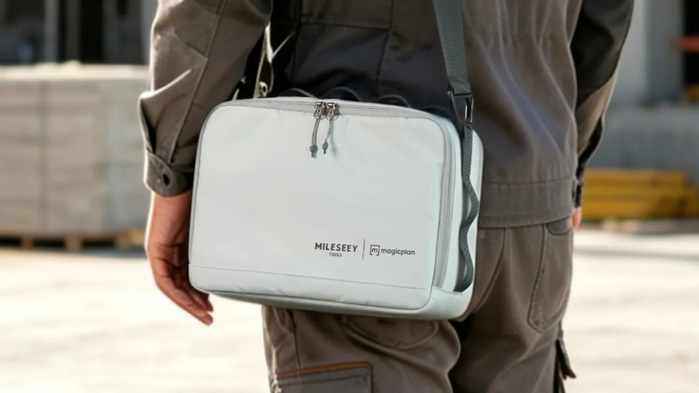 MILESEEY Tools x magicplan M2 crossbody bag worn on a jobsite