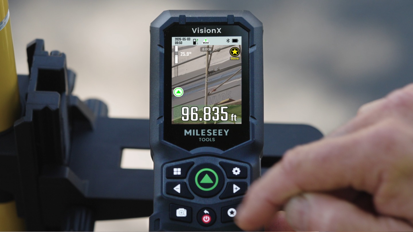 MILESEEY S50C camera laser measure targeting a distant object with VisionX